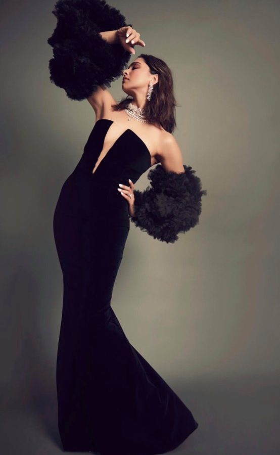 Deepika Padukone looks stunning in this figure-hugging black gown in with gorgeous jewels.