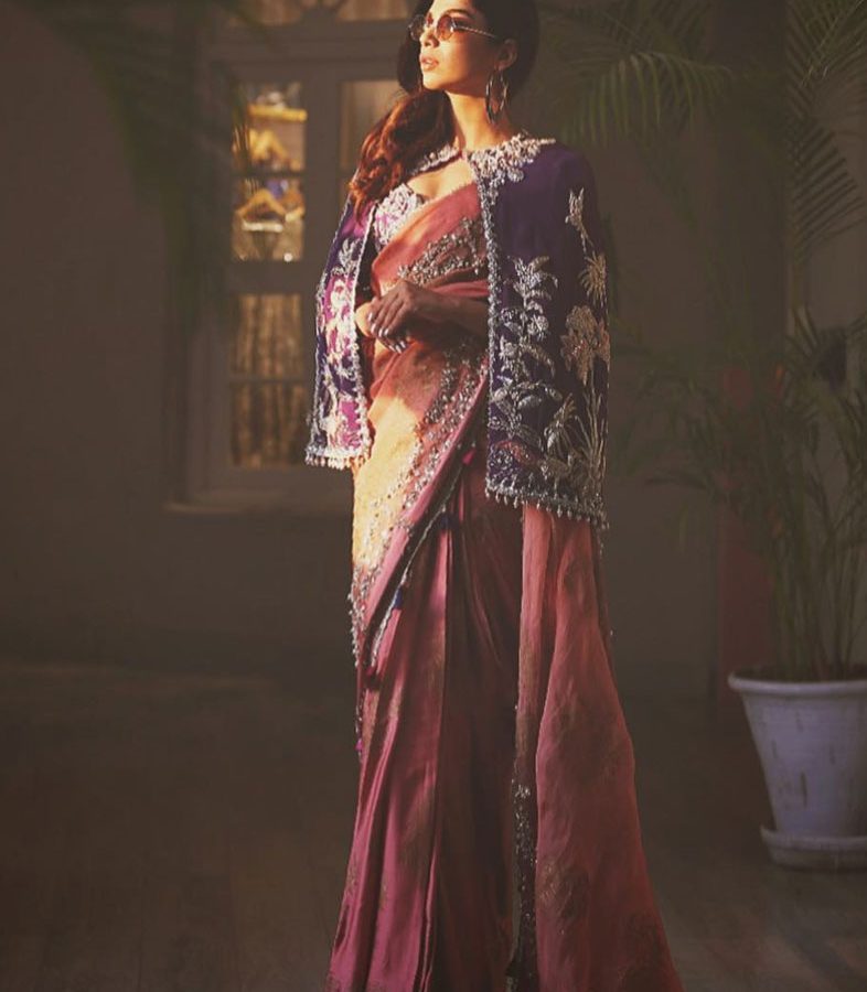 This Elan pink sari with a purple cape is dazzling!