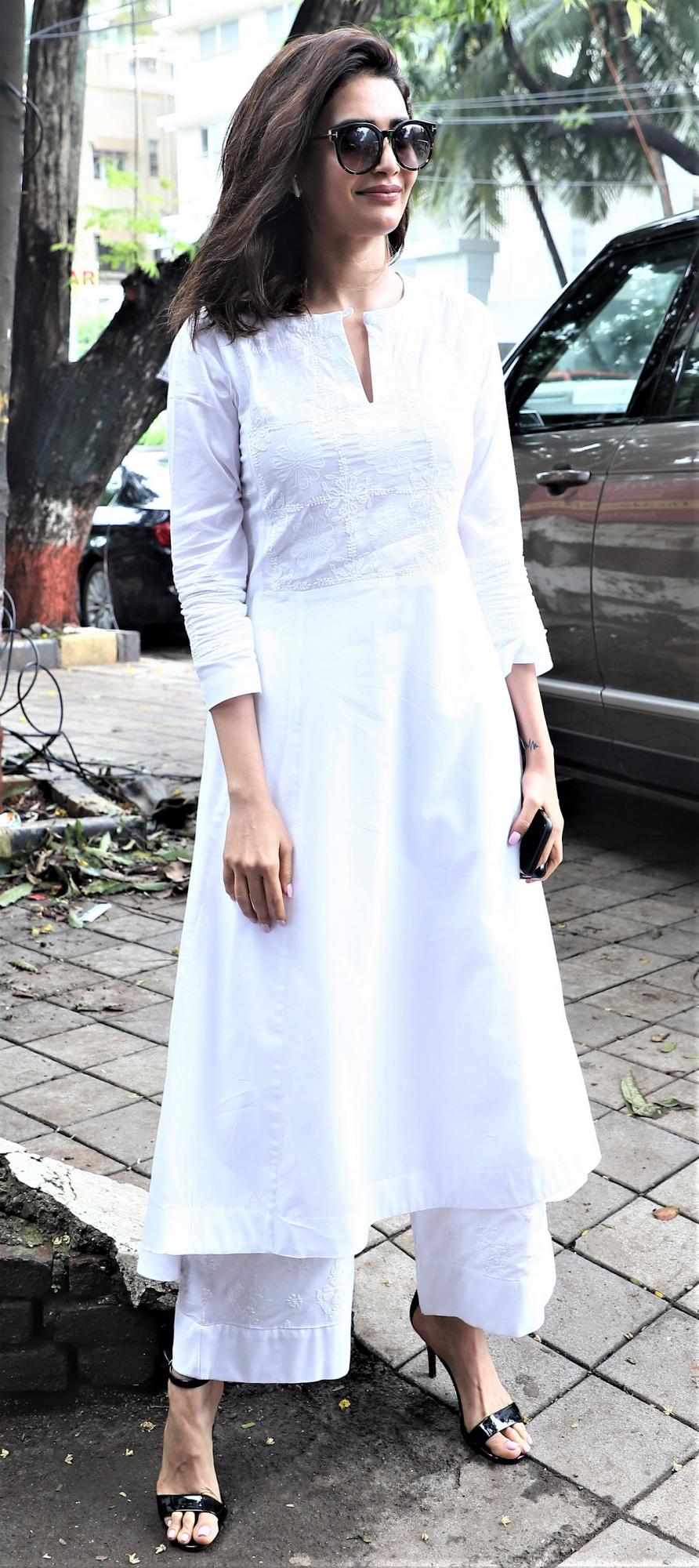 Karishma Tanna Looks Stunning in White - Masala