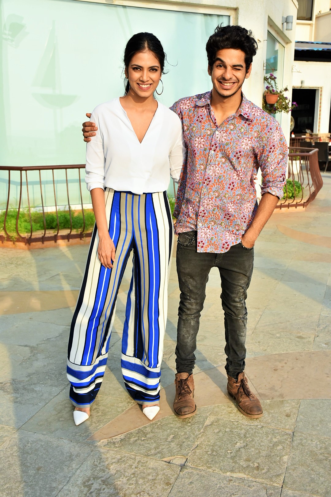 Malavika Mohanan and Ishaan Khattar pose for the cameras during the promotions of their upcoming film 'Beyond The Clouds'