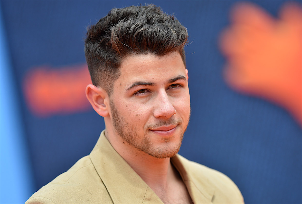 Nick Jonas Shares A Throwback Picture Flaunting His Imaginary Bicep Bulge -  Masala