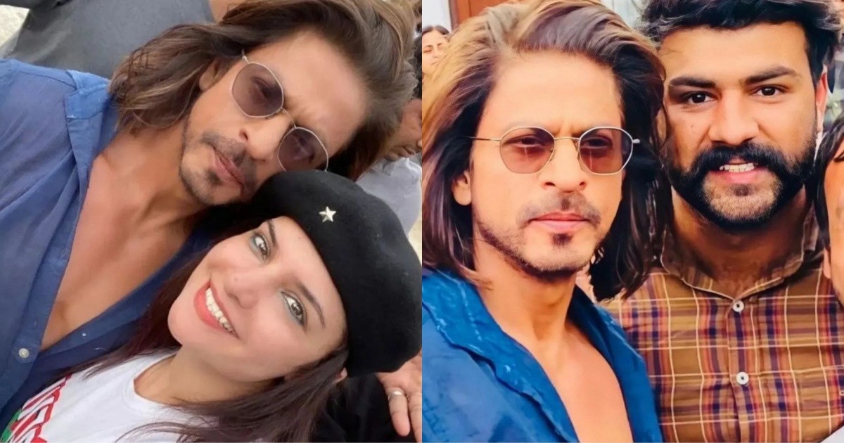 Shah Rukh Khan posing with fans flaunting long hair in Spain Shah Rukh Khan posing with fans flaunting long hair in Spain