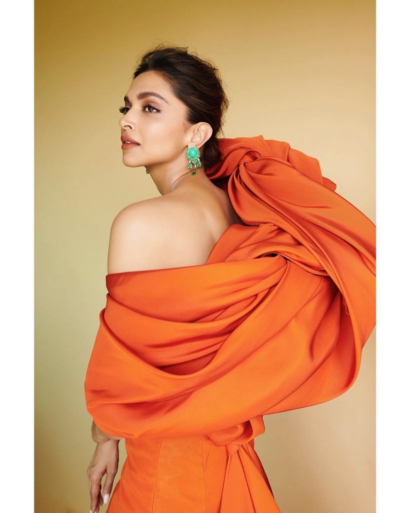 Deepika Padukone's Orange Co-Ord Set With A Louis Vuitton Bag At