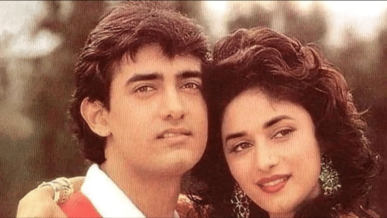 When Aamir Khan pulled a naughty prank on Madhuri Dixit leaving her angry & chasing him with a hockey stick on a film set