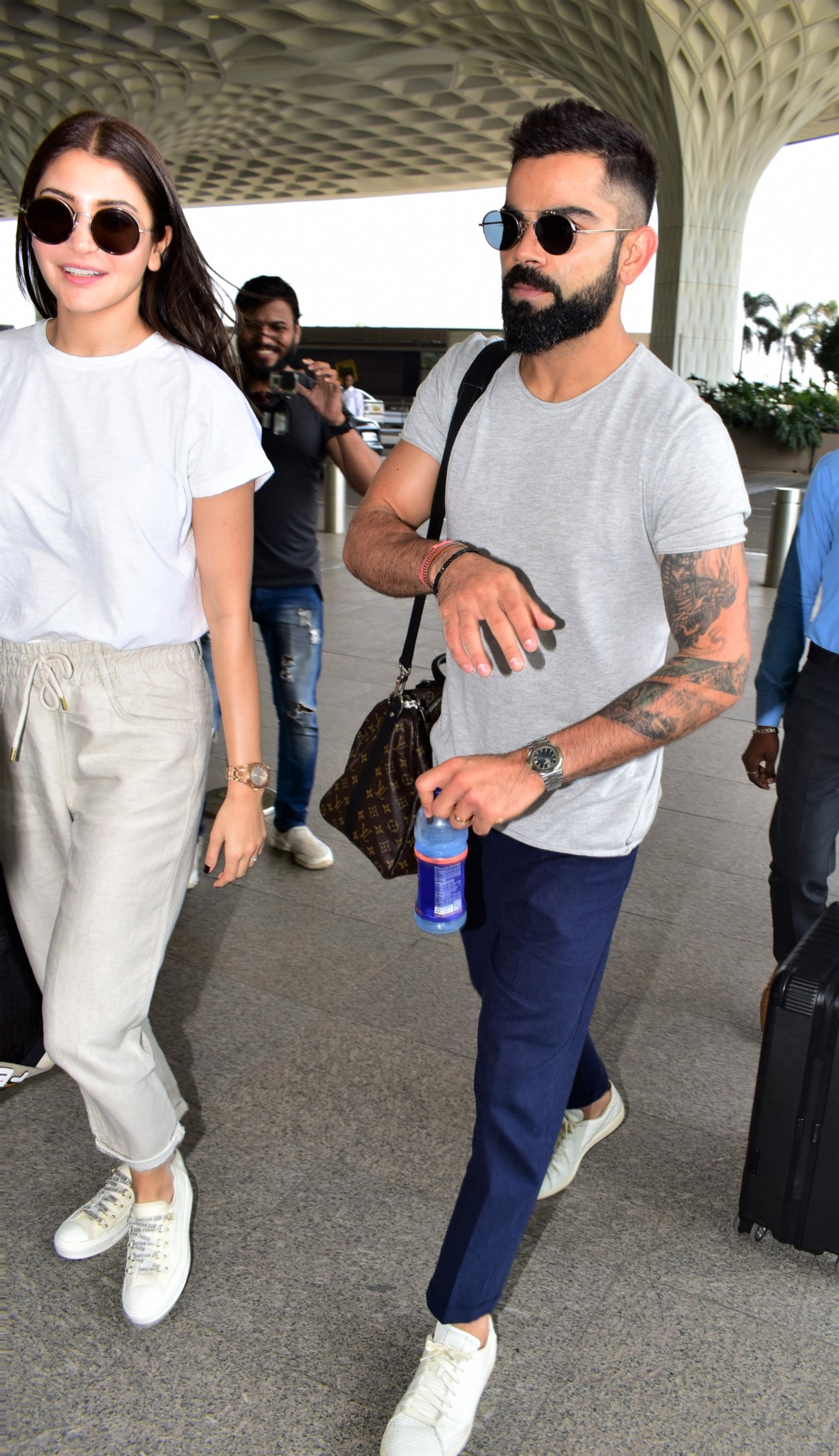 virat kohli wearing white sneakers