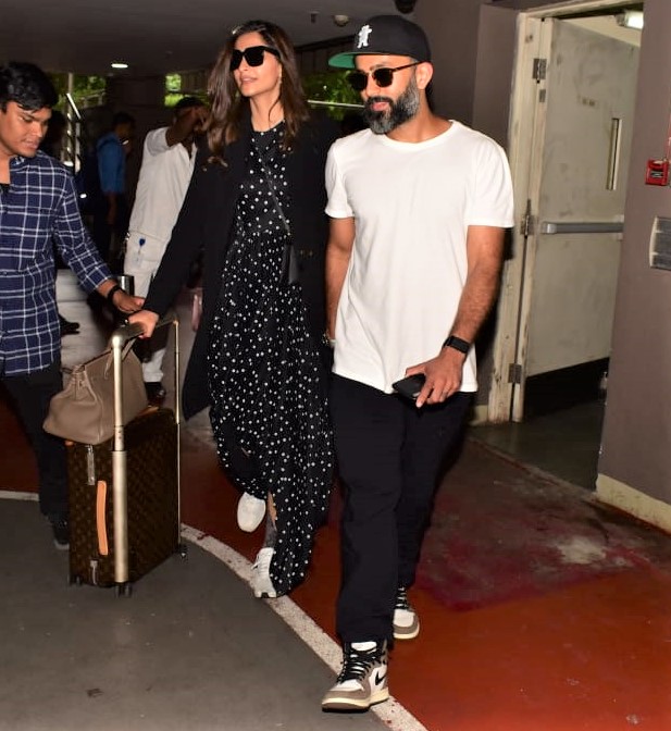 Sonam Kapoor Ahuja paired her white maxi dress with Dior Air Jordans for  extra drama | VOGUE India
