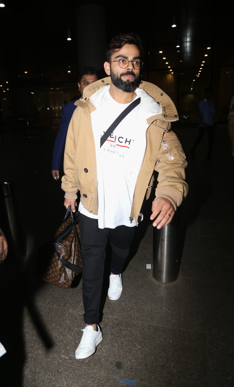 Virat Kohli, Anushka Sharma Serve Airport Style Goals In Latest Pics - Masala.com