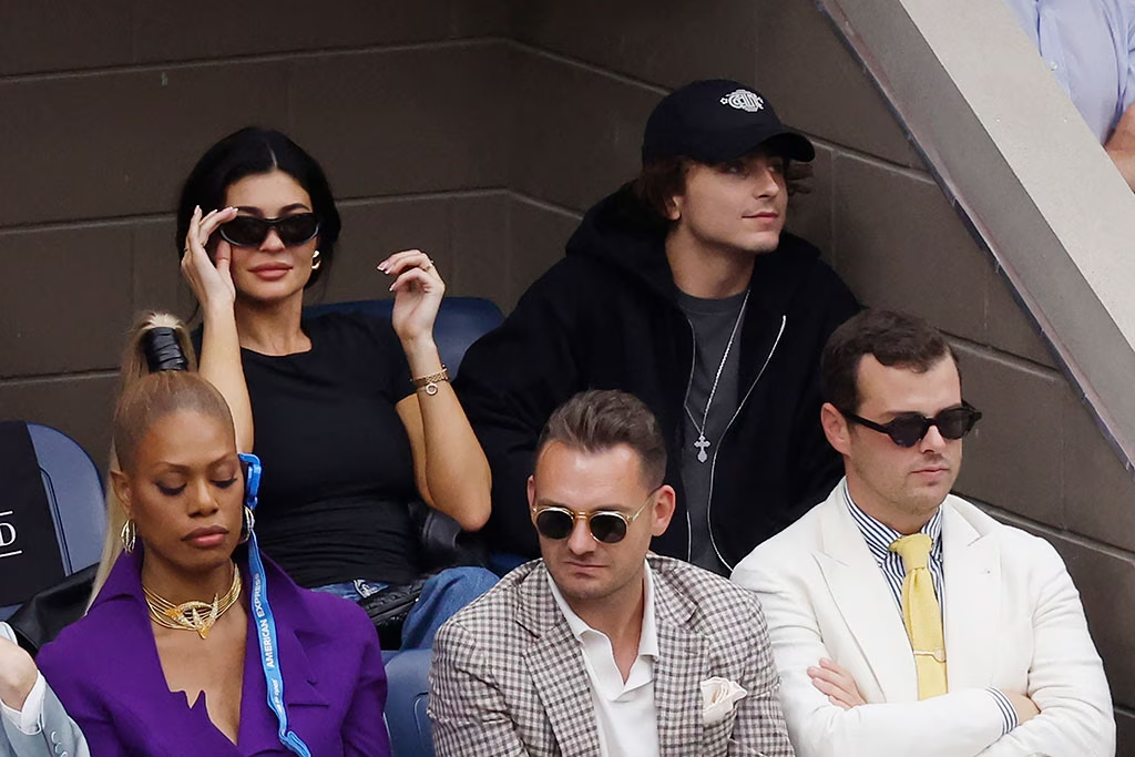 Kylie Jenner and Timothée Chalamet can't keep their hands to themselves