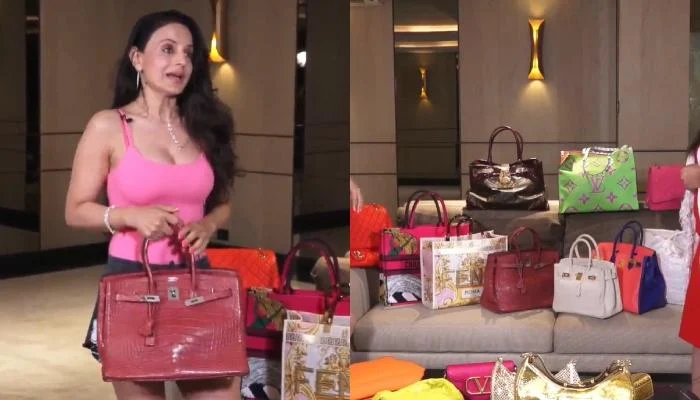 Ameesha Patel flashes her personalized Louis Vuitton bag at PVR